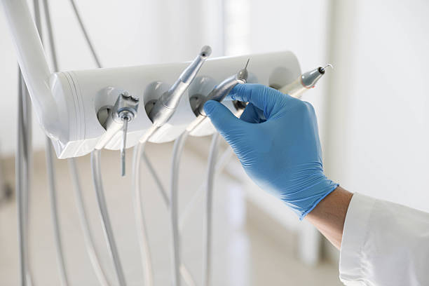Professional Tooth Extraction technician working in Harrisburg, OR